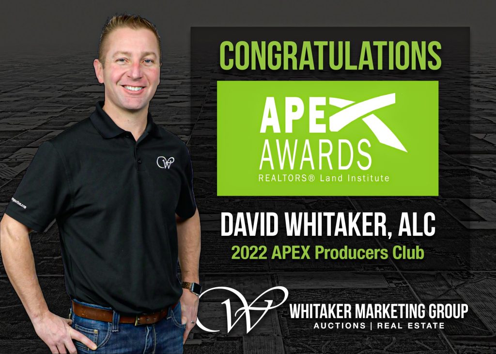 Farmland real estate professional recognized with a national APEX Award from the Realtors Land Institute, displayed alongside award branding and company logo.