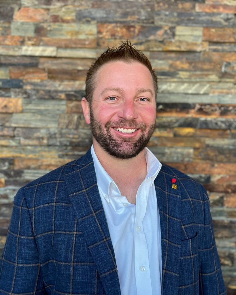 David Whitaker, Iowa RLI National President and Accredited Land Consultant, smiling at an industry event