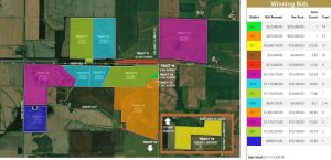 Map of Washington and Louisa County Iowa Farmland Auction Results showing 14 tracts sold by Whitaker Marketing Group with bid prices and acreage.