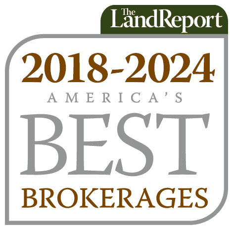 Land Report badge showing Whitaker Marketing Group as one of America’s Best Brokerages from 2018 to 2024.