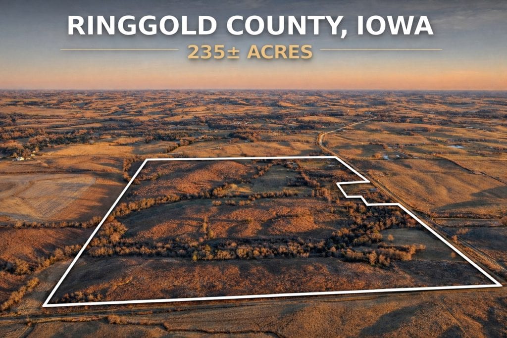 Featured aerial image of Ringgold County Iowa land with white boundary lines outlining one tract totaling 154.5± acres.