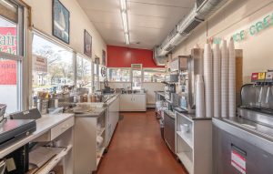 Interior kitchen and ice cream service area at Dairy Isle & Grill restaurant for sale in Steelville Missouri