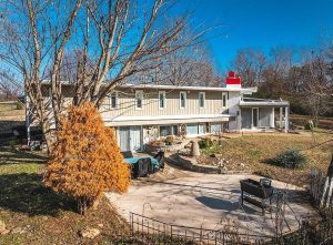 Frank Lloyd Wright inspired home with patio for sale near Rolla Missouri