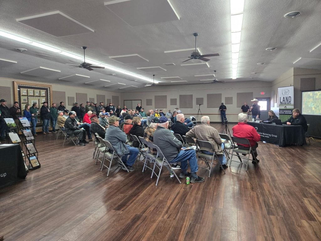 Landowners and buyers attending a transparent farmland auction hosted by Whitaker Marketing Group
