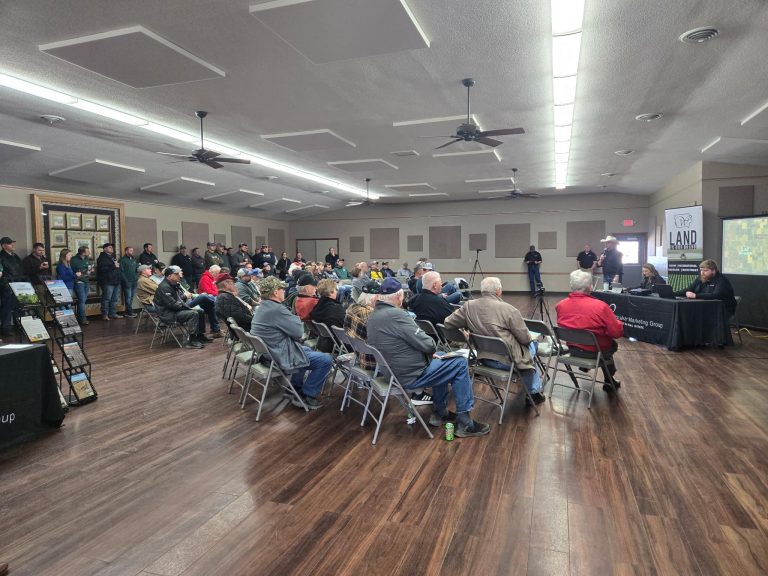 Landowners and buyers attending a transparent farmland auction hosted by Whitaker Marketing Group