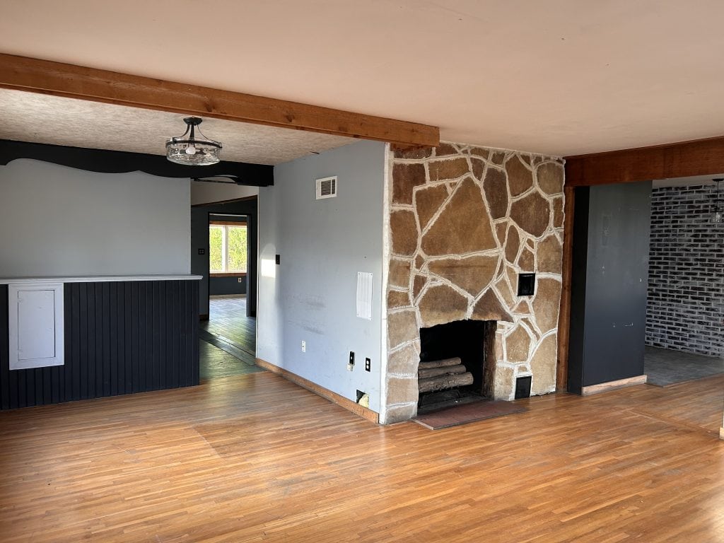 Cuba Missouri commercial property for sale interior with fireplace and open office or retail space
