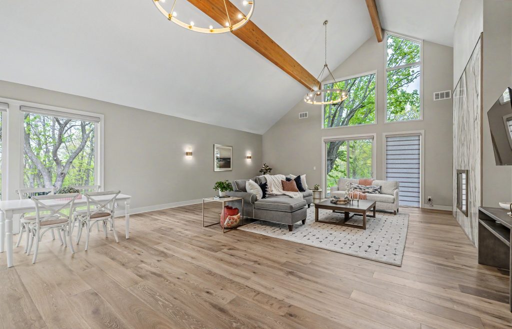 Open concept luxury living room inside West Des Moines Iowa acreage home for sale
