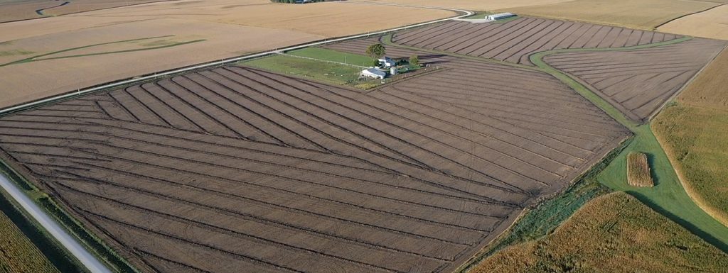 Aerial view of Iowa farmland with visible drain tile patterns