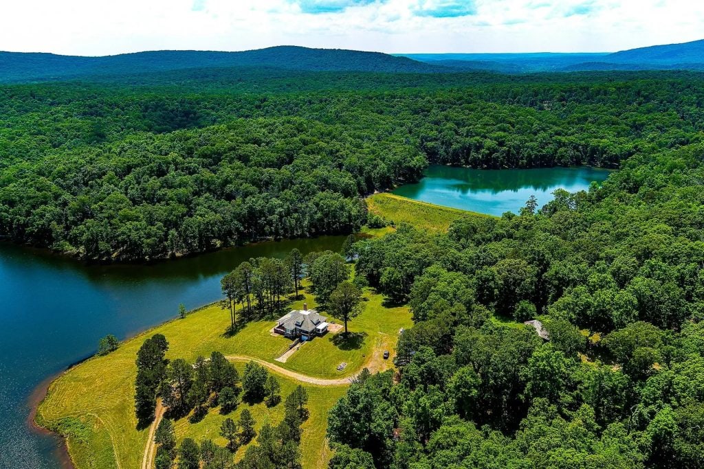 Functional acreage property with water access, timber, and usable rural land